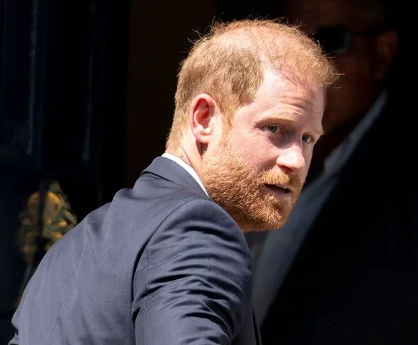Prince Harry leaving a court building